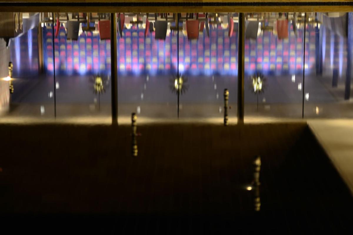 a view of a stage with blue lights in the background at Marasa Sarovar Premiere in Tirupati