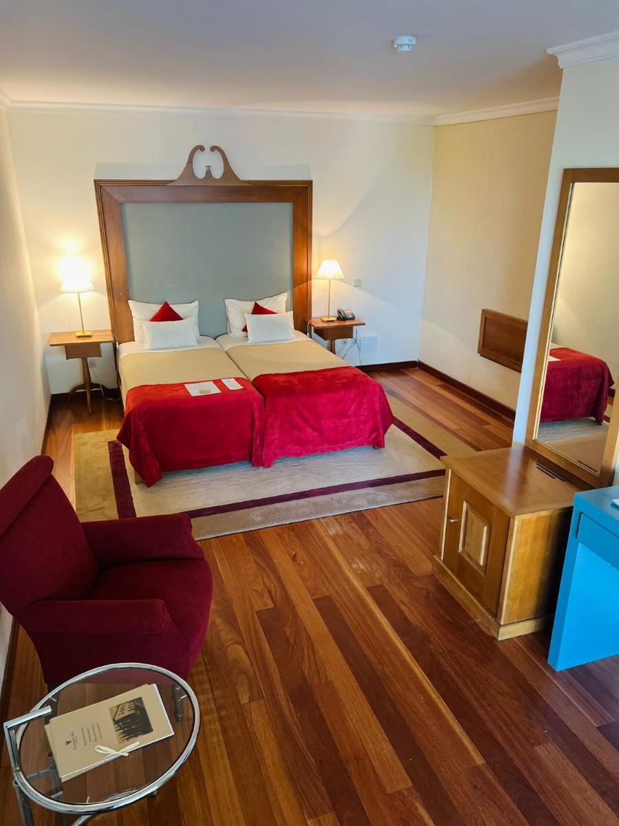 Uma cama ou camas num quarto em Estalagem do Vale