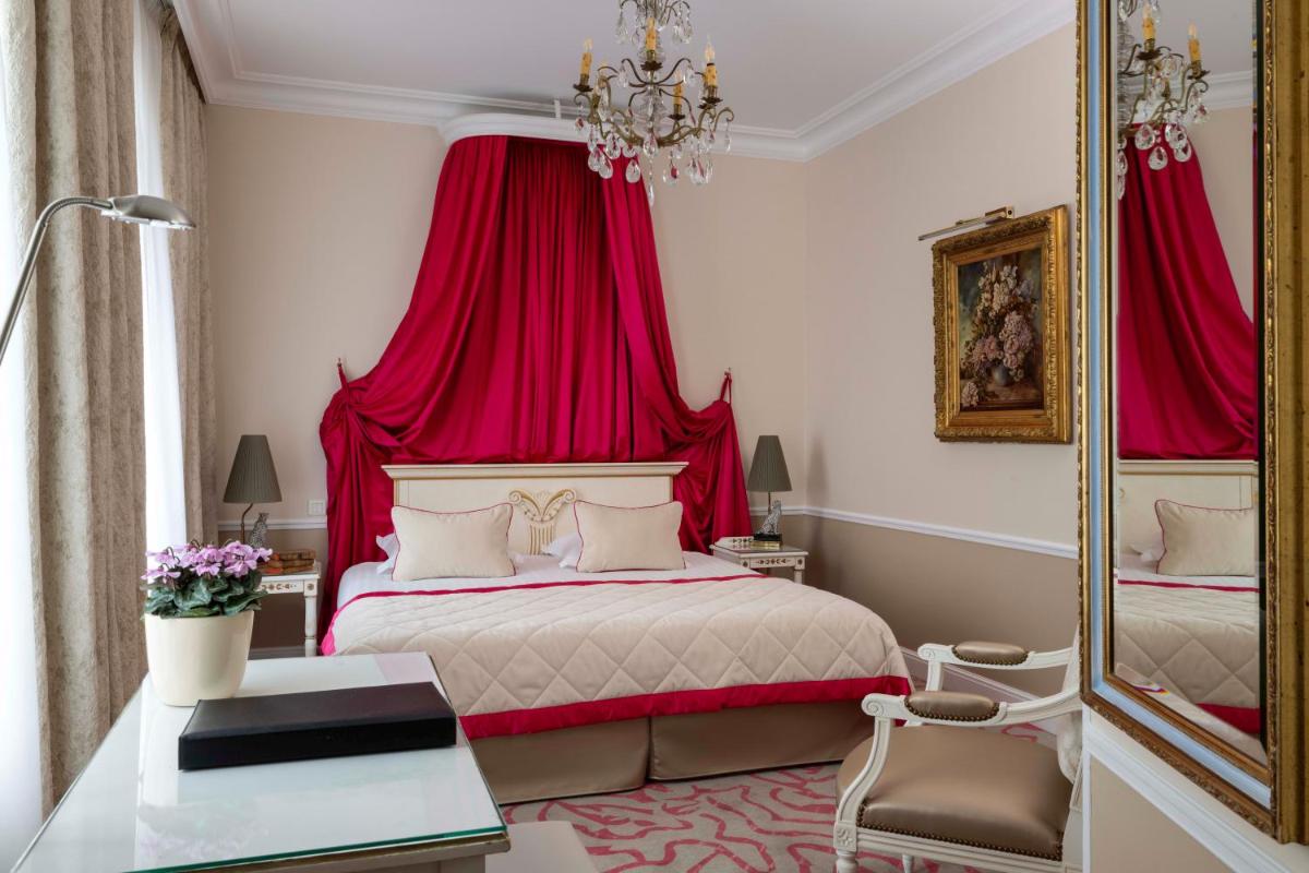 Un ou plusieurs lits dans un hébergement de l'établissement Hotel & Spa Saint-Jacques
