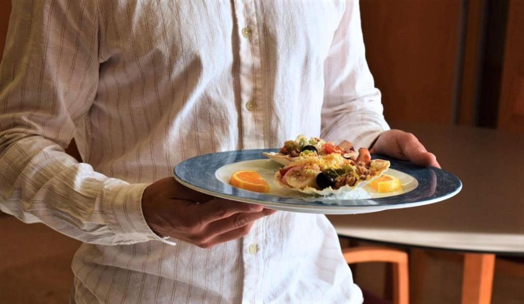 Comida en o cerca de este hotel