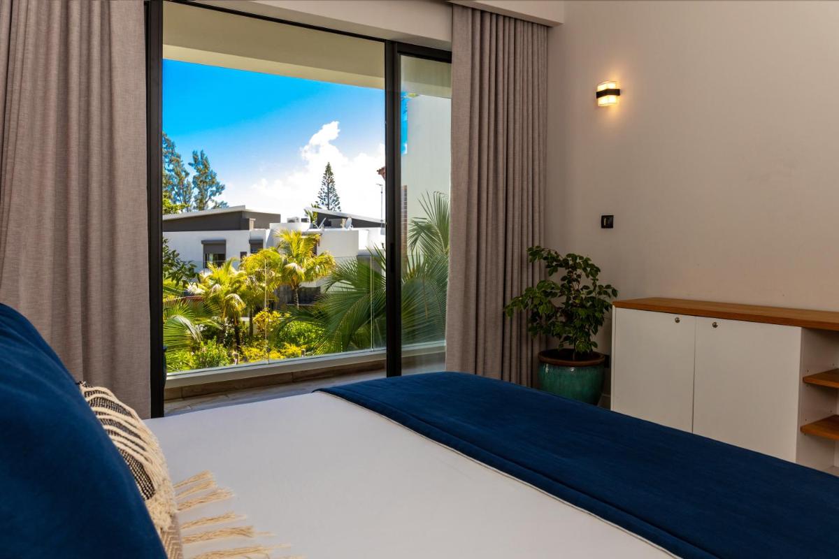 Tropical beachfront apartment - Housity