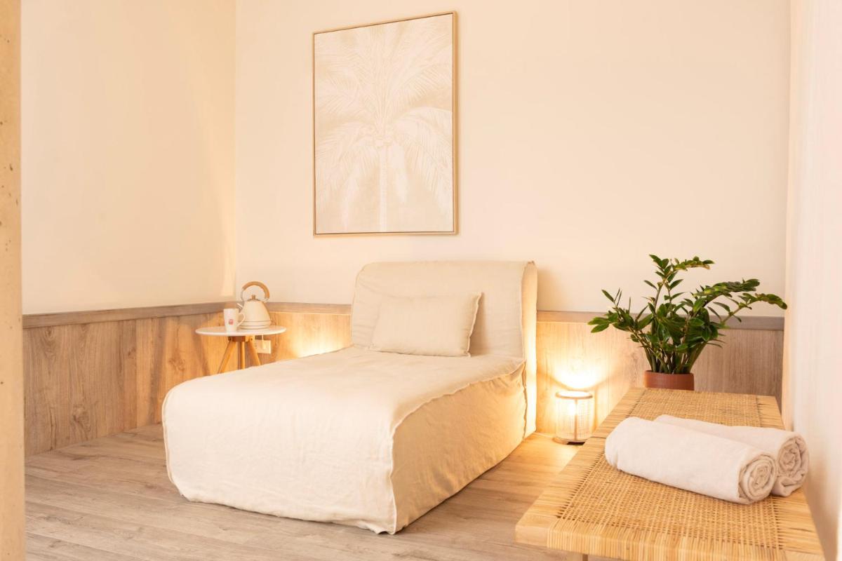 Cama o camas de una habitación en Inturotel Sa Marina