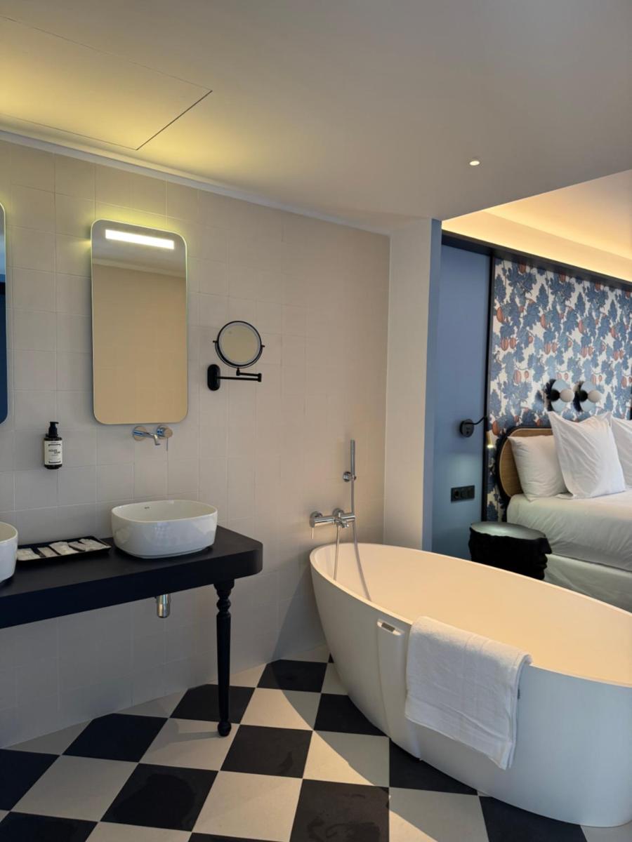 Un baño de Hotel Divino & Aparthotel Un baño de Hotel Divino & Aparthotel