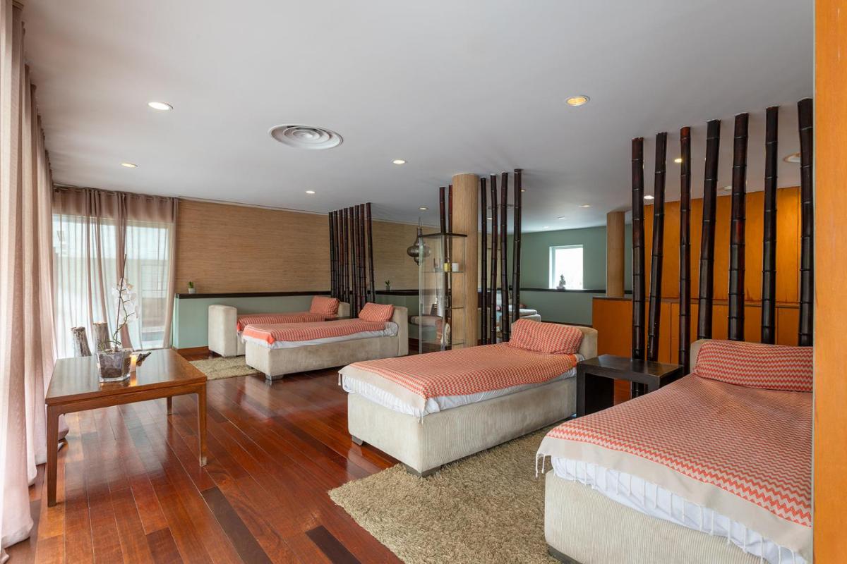 Uma cama ou camas num quarto em Pestana Palace Lisboa Hotel & National Monument - The Leading Hotels of the World