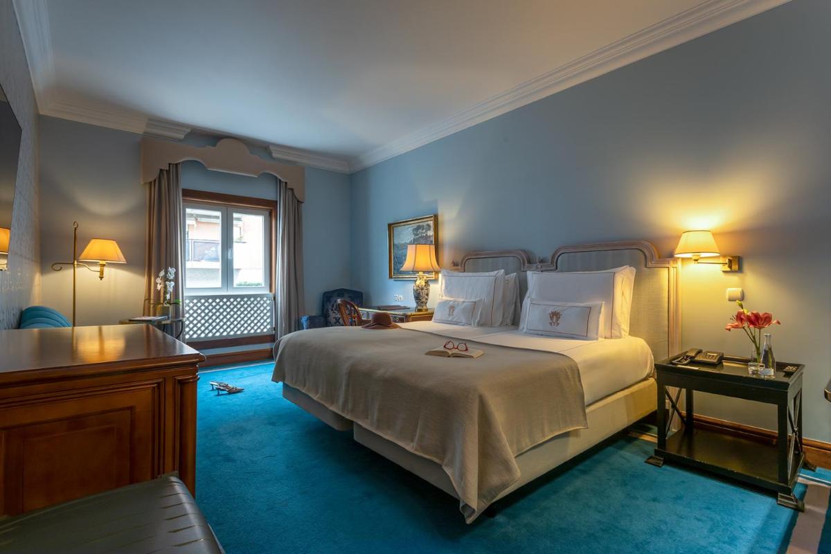 Uma cama ou camas num quarto em Pestana Palace Lisboa Hotel & National Monument - The Leading Hotels of the World
