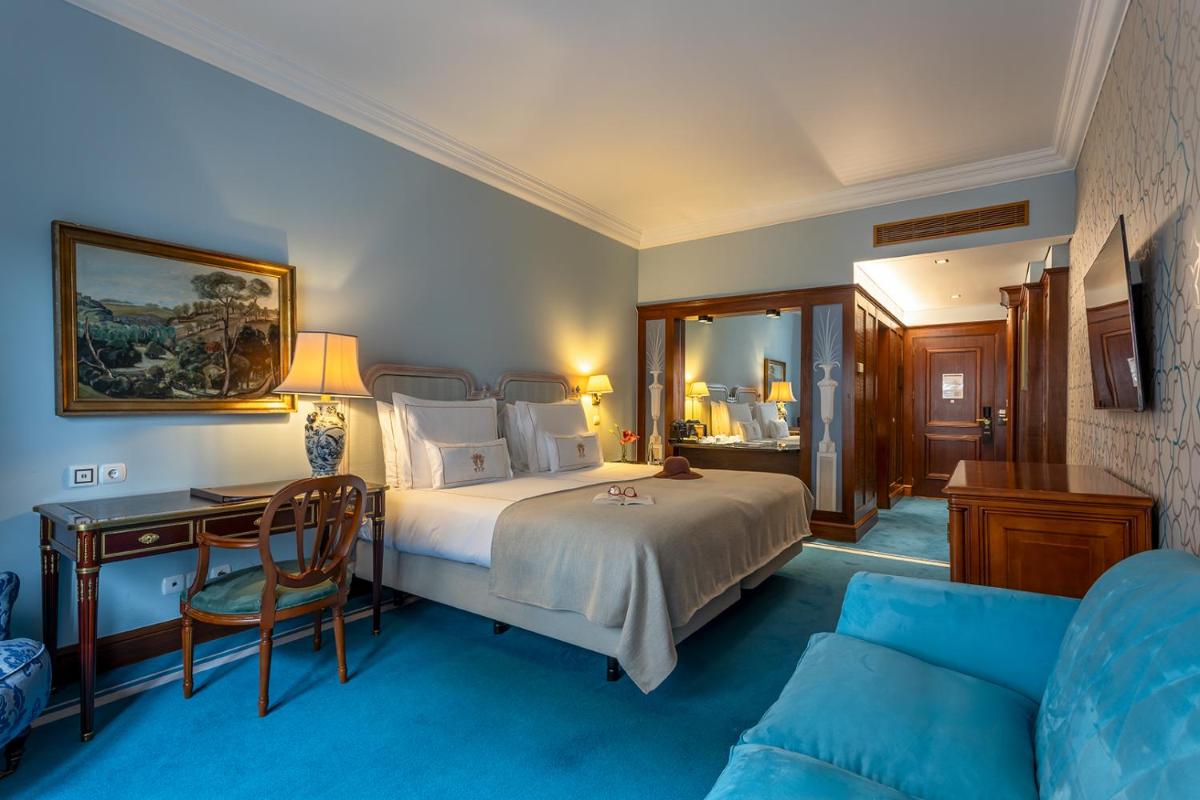 Uma cama ou camas num quarto em Pestana Palace Lisboa Hotel & National Monument - The Leading Hotels of the World