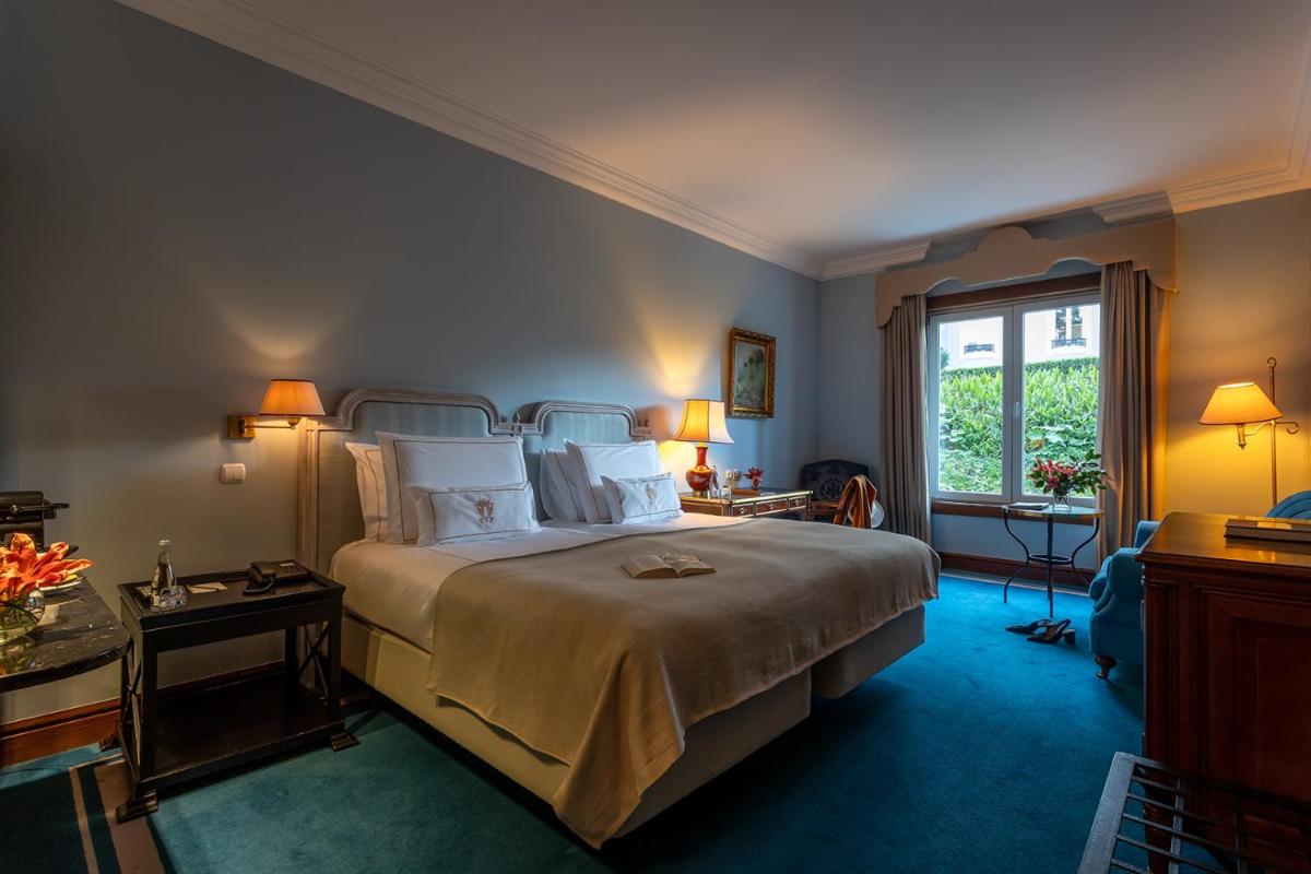 Uma cama ou camas num quarto em Pestana Palace Lisboa Hotel & National Monument - The Leading Hotels of the World