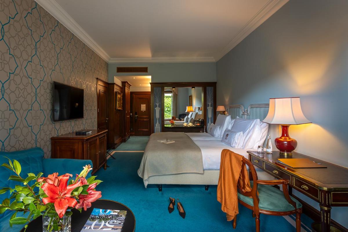 Uma cama ou camas num quarto em Pestana Palace Lisboa Hotel & National Monument - The Leading Hotels of the World