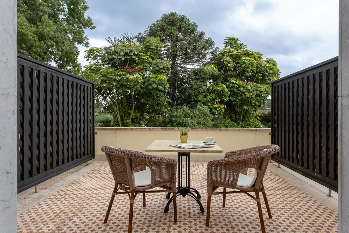 Uma varanda ou terraço em Pestana Palace Lisboa Hotel & National Monument - The Leading Hotels of the World