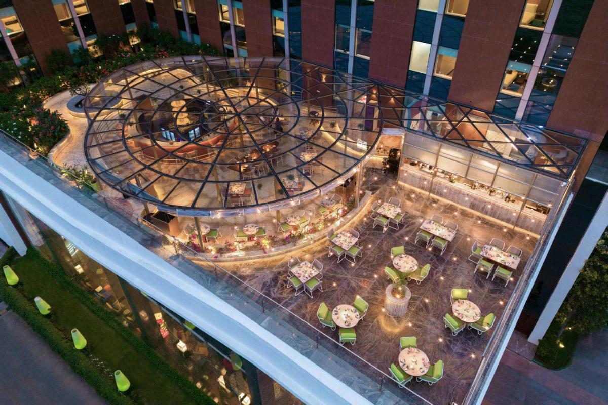 an aerial view of a restaurant on a building at Aloft Bengaluru Outer Ring Road in Bengaluru