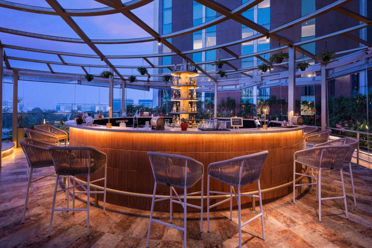 a bar on the top of a building at Aloft Bengaluru Outer Ring Road in Bengaluru