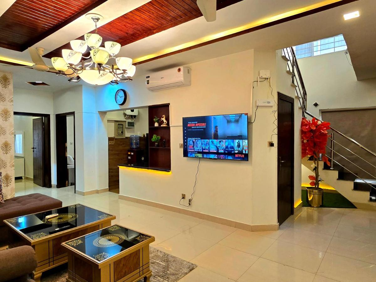 The Millenial Apartments & Suites Bahria Town - Housity