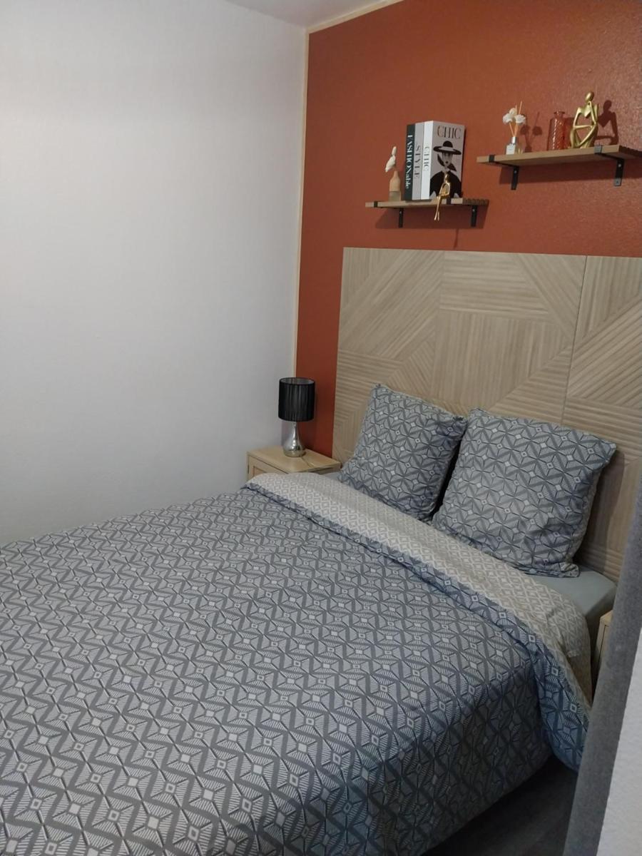 T2 Rez de chaussée climatisé jardin parking privé - Housity
