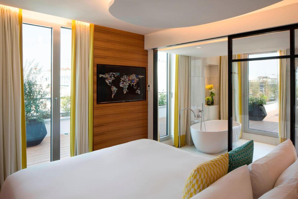 Un ou plusieurs lits dans un hébergement de l'établissement Renaissance Paris Republique Hotel & Spa