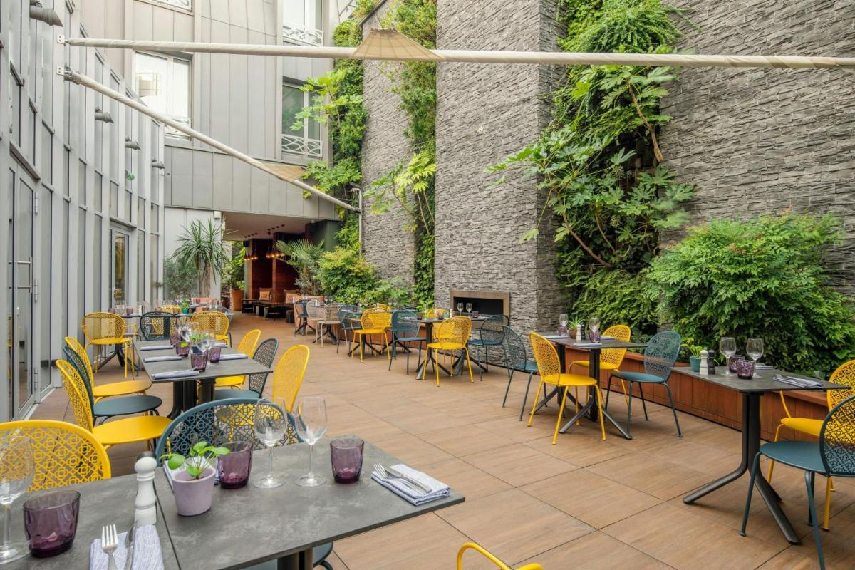 Restaurant ou autre lieu de restauration dans l'établissement Renaissance Paris Republique Hotel & Spa