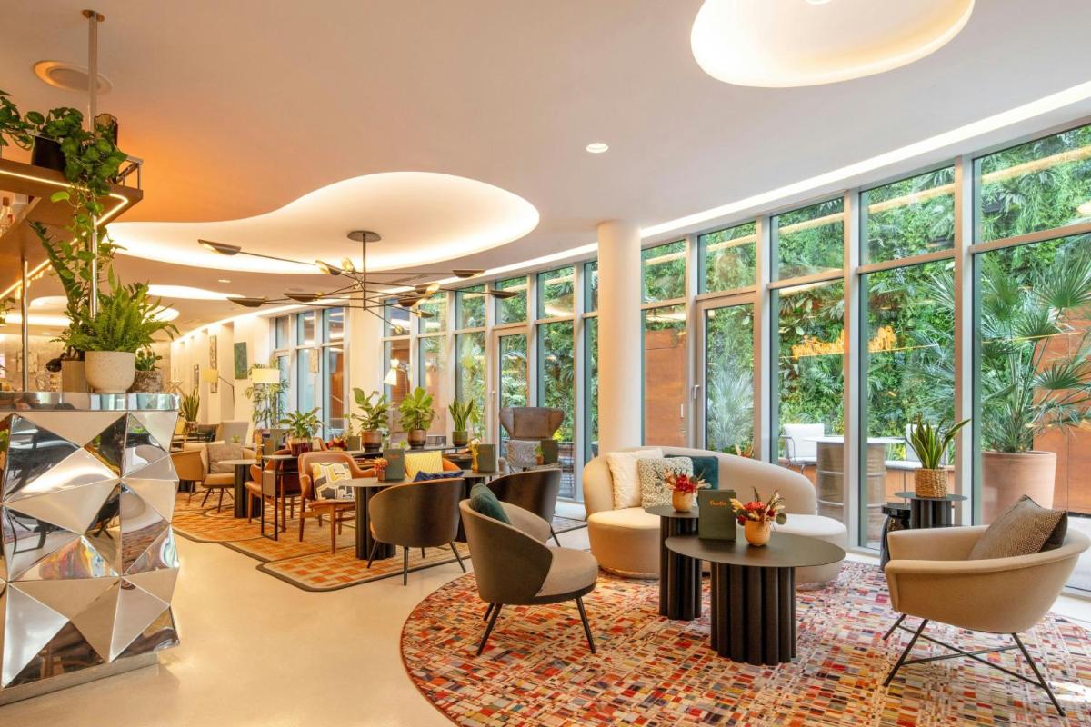 Coin salon dans l'établissement Renaissance Paris Republique Hotel & Spa