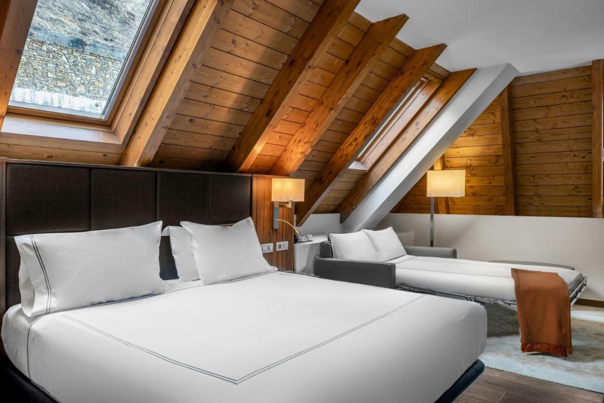 Cama o camas de una habitación en Hotel AC Baqueira Ski Resort, Autograph Collection