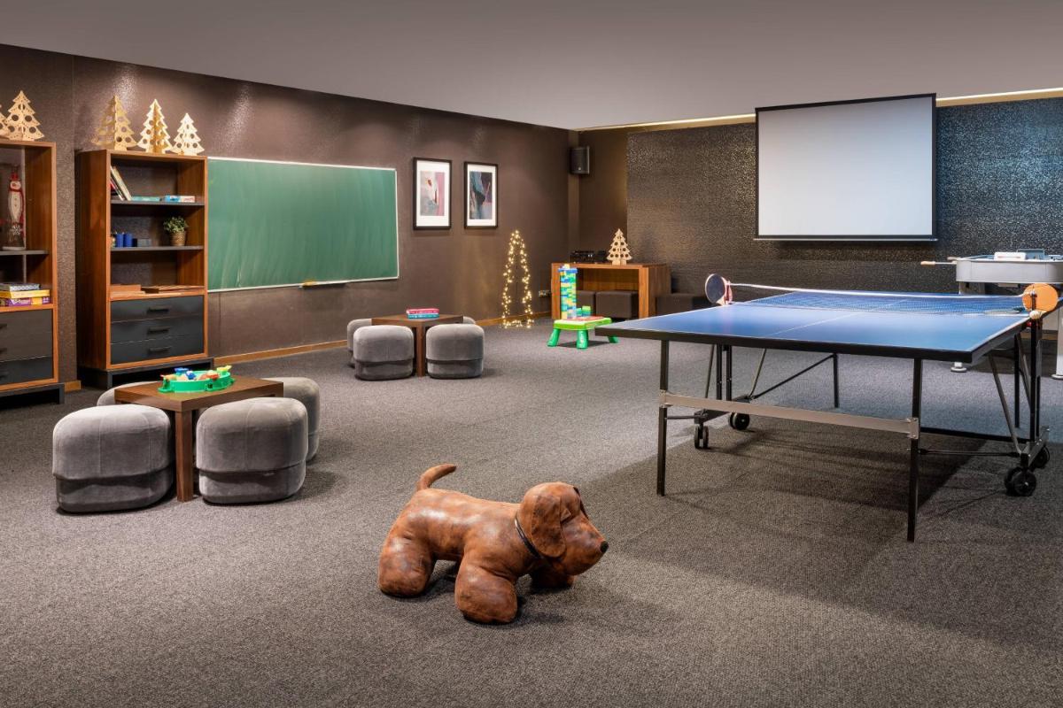 Sala de juegos en Hotel AC Baqueira Ski Resort, Autograph Collection
