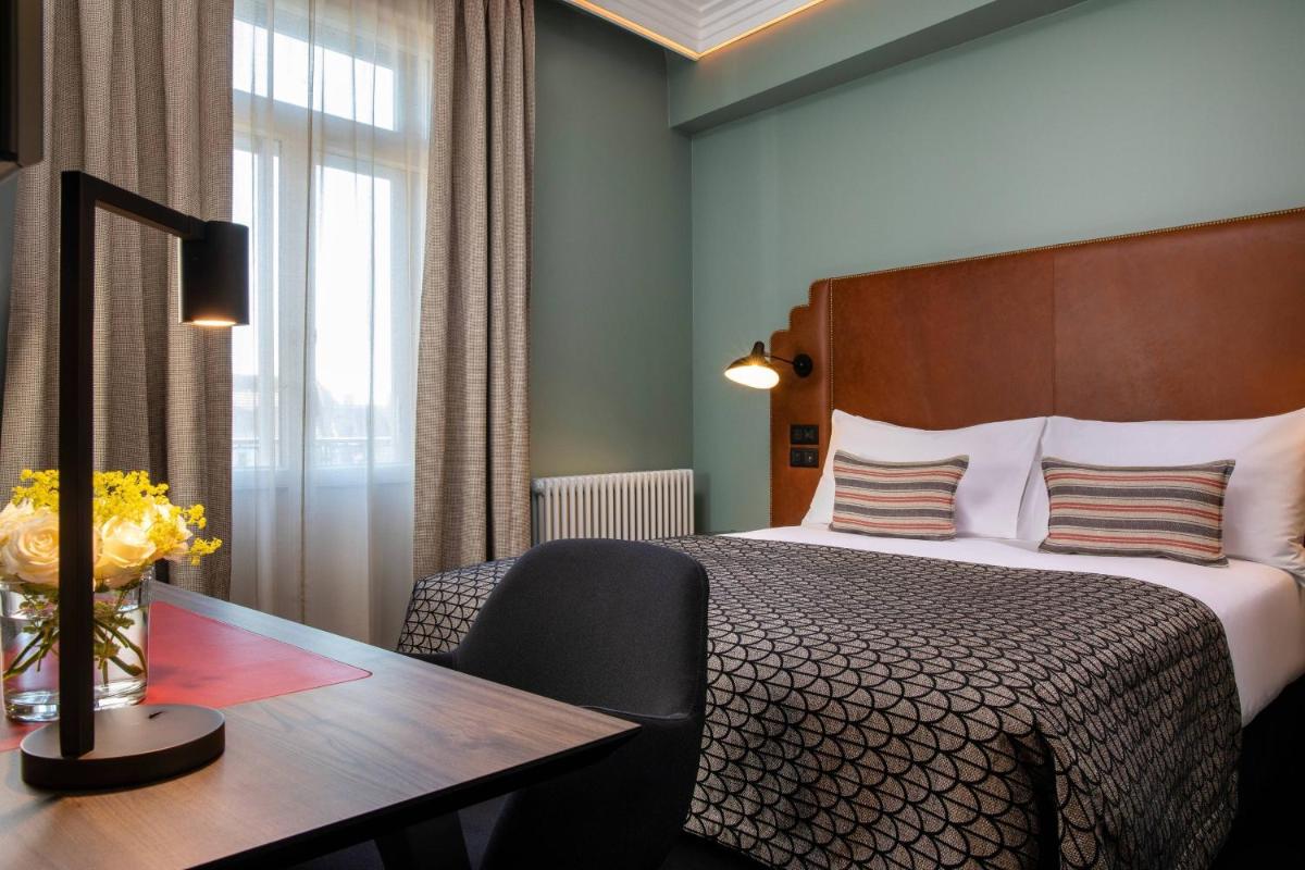 Un ou plusieurs lits dans un hébergement de l'établissement Maison Rouge Strasbourg Hotel & Spa, Autograph Collection