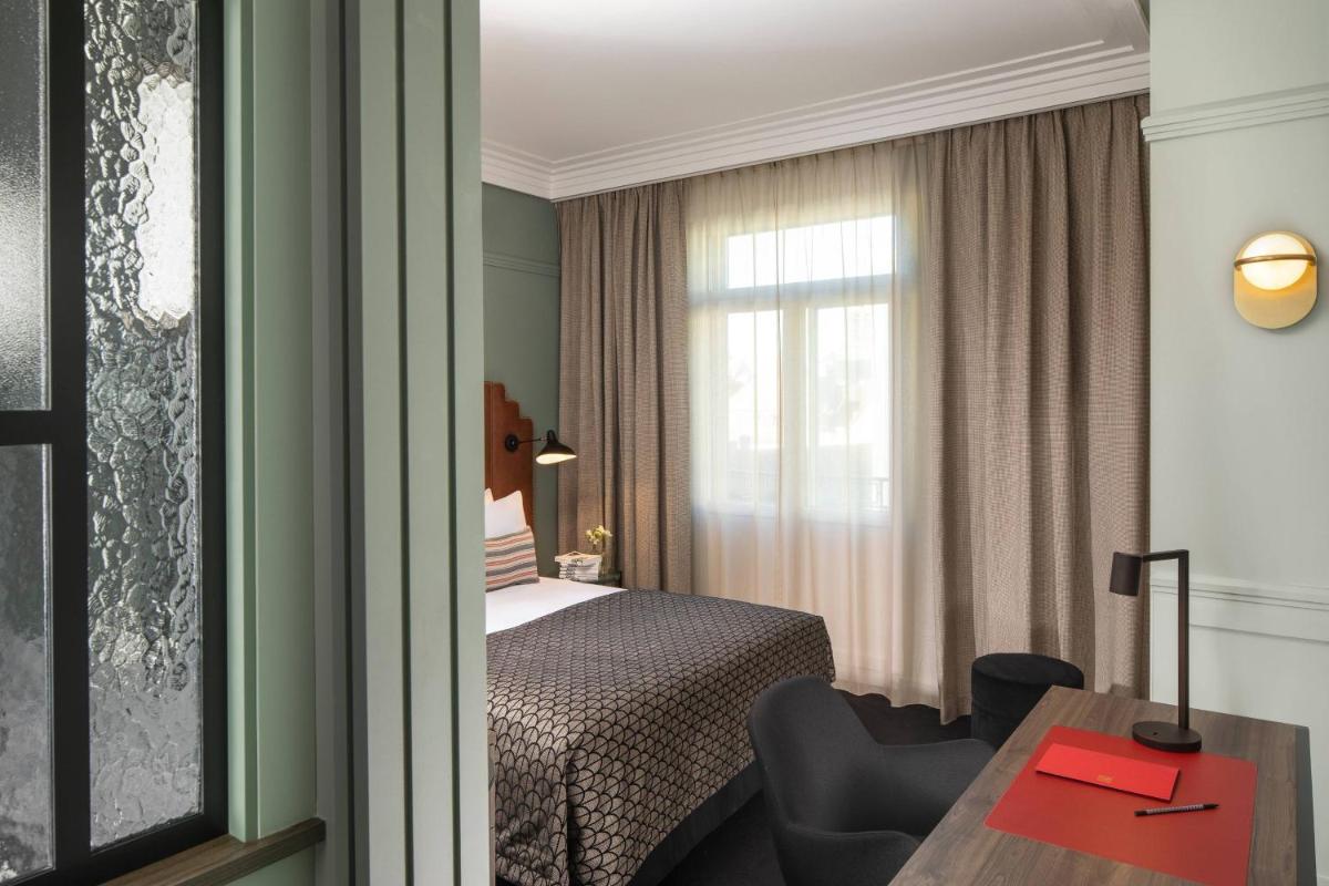 Un ou plusieurs lits dans un hébergement de l'établissement Maison Rouge Strasbourg Hotel & Spa, Autograph Collection