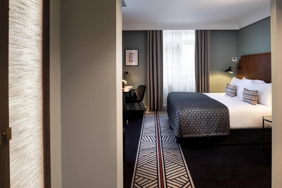 Un ou plusieurs lits dans un hébergement de l'établissement Maison Rouge Strasbourg Hotel & Spa, Autograph Collection