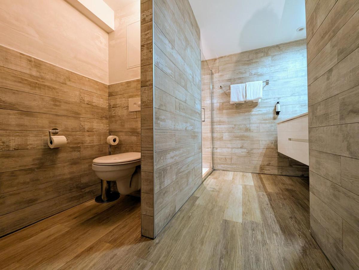 Salle de bains dans l'établissement Hôtel Le Dormeur