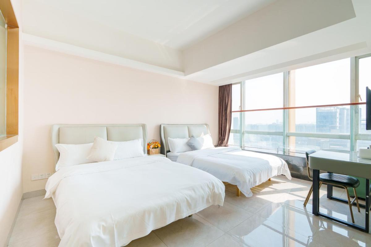 Sunny International Apartment From Beiiing Road - Hizvo