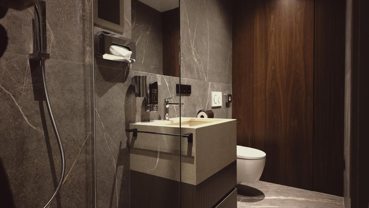 Ein Badezimmer in der Unterkunft Bellman Hotel Ein Badezimmer in der Unterkunft Bellman Hotel