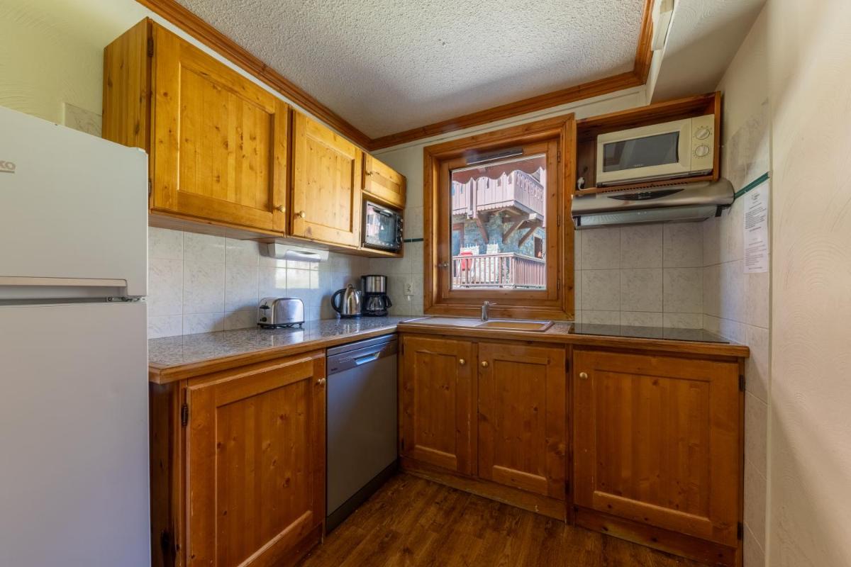 Cuisine ou kitchenette dans l'établissement Résidences Village Montana by Les Etincelles