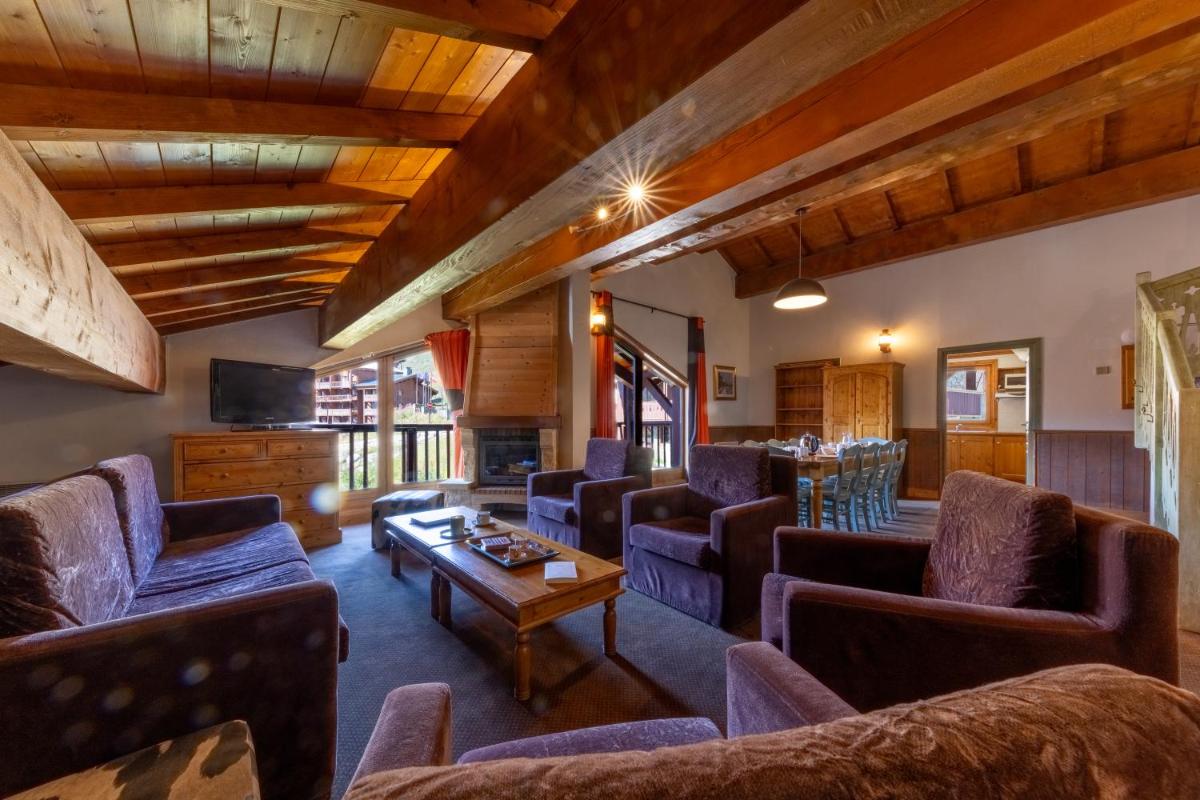 Coin salon dans l'établissement Résidences Village Montana by Les Etincelles