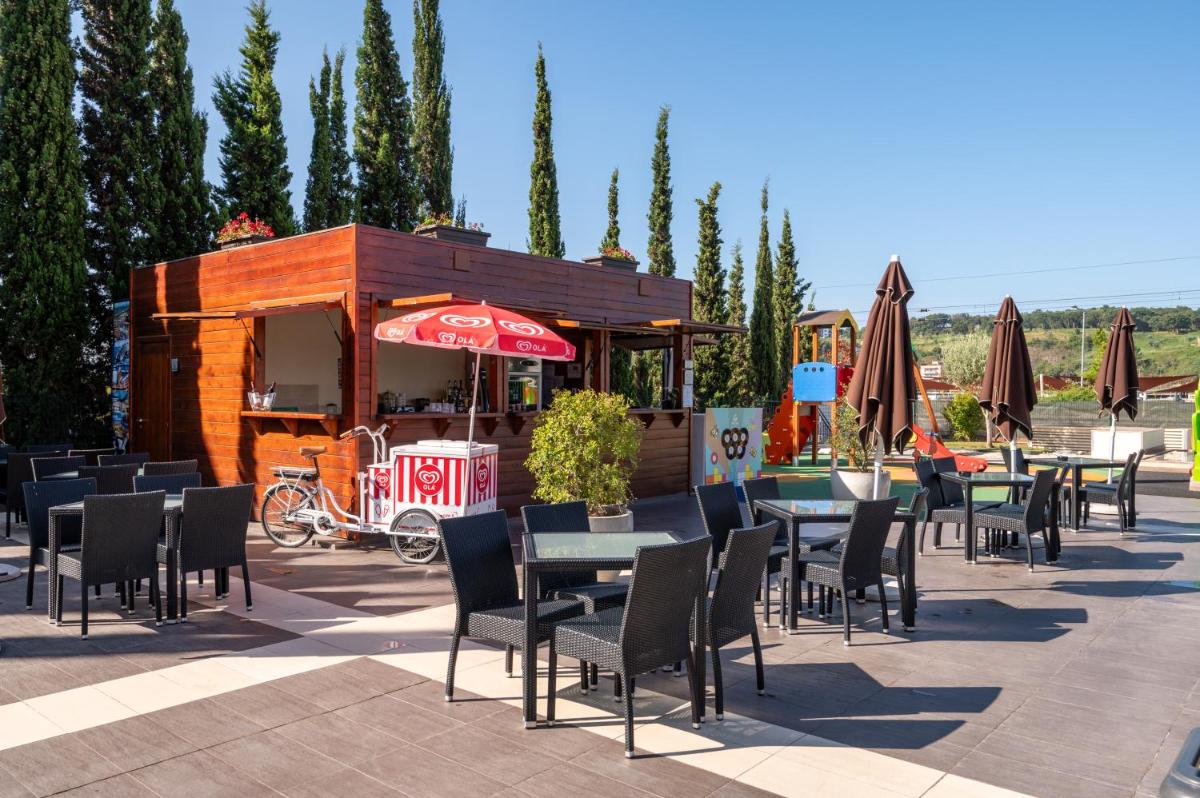 Um restaurante ou outro lugar para comer em Vila Gale Coimbra