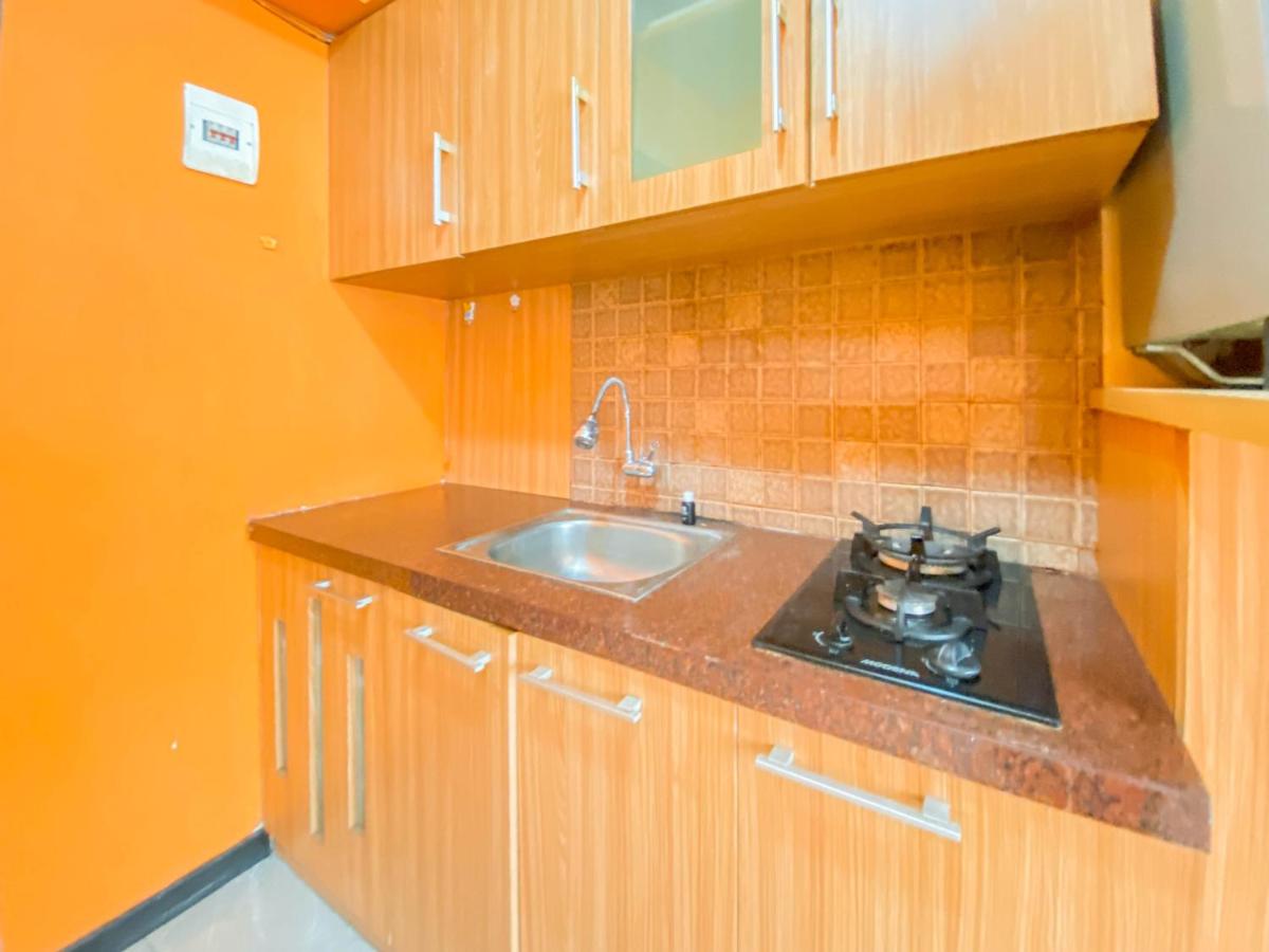 Homey Living 2BR at Jarrdin Cihampelas Apartment By Travelio - Housity