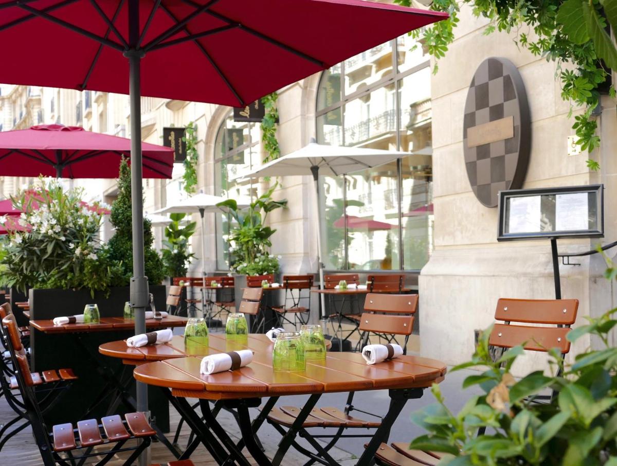 Restaurant ou autre lieu de restauration dans l'établissement Sofitel Paris Arc De Triomphe