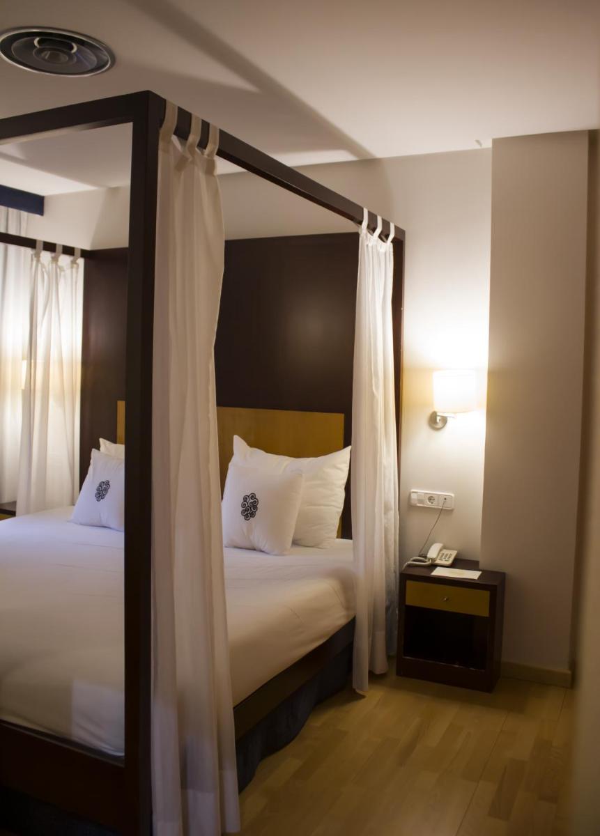 Cama o camas de una habitación en Lobios Caldaria Hotel Balneario