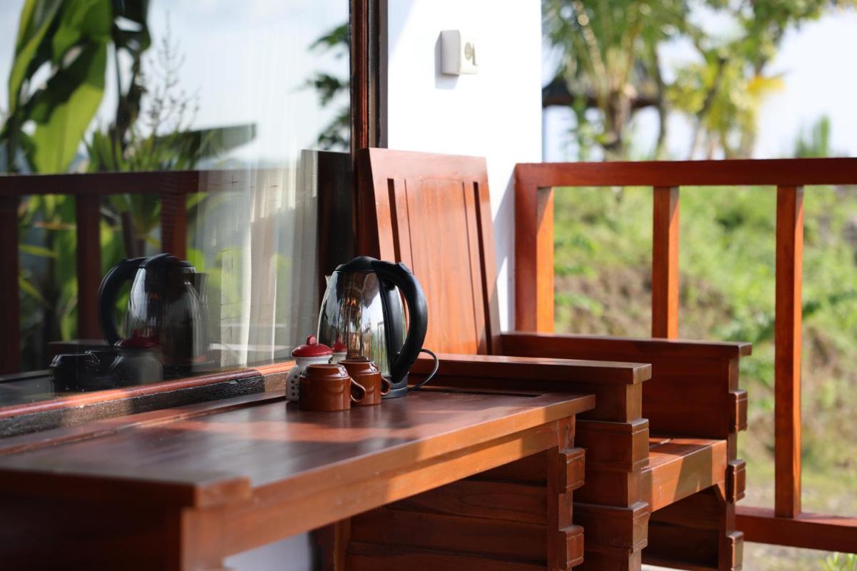 Ayu Hill Bungalows - Housity