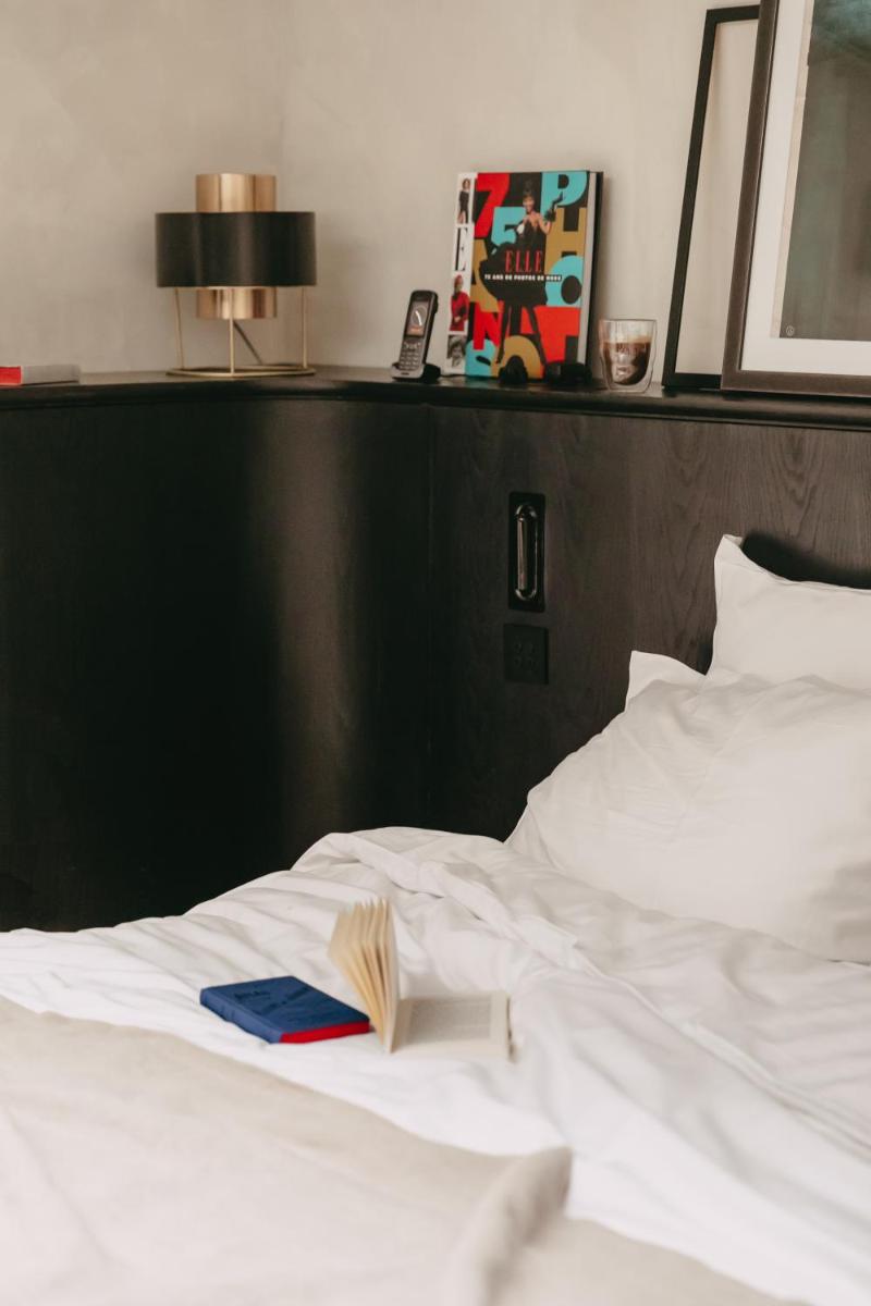 Un ou plusieurs lits dans un hébergement de l'établissement Maison ELLE Paris