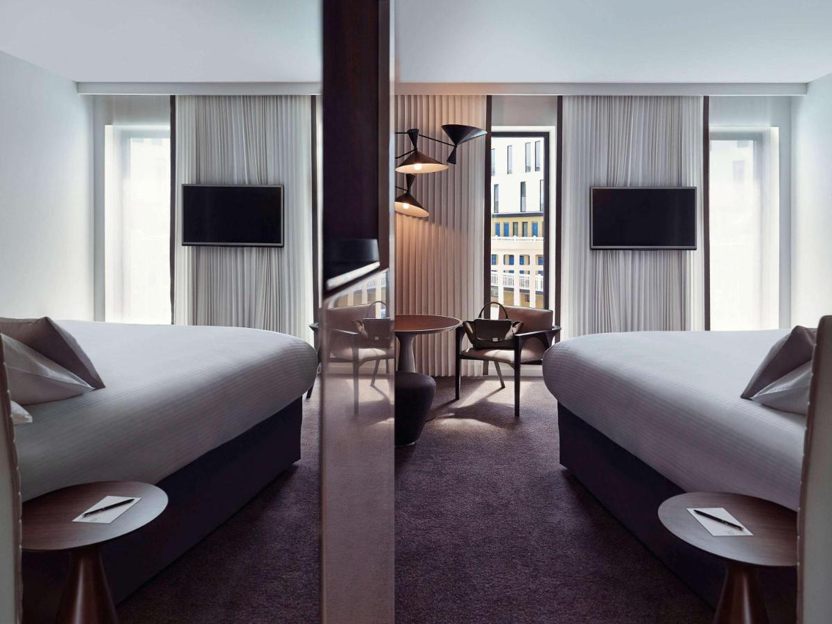 Un ou plusieurs lits dans un hébergement de l'établissement Molitor Hotel & Spa Paris - MGallery Collection