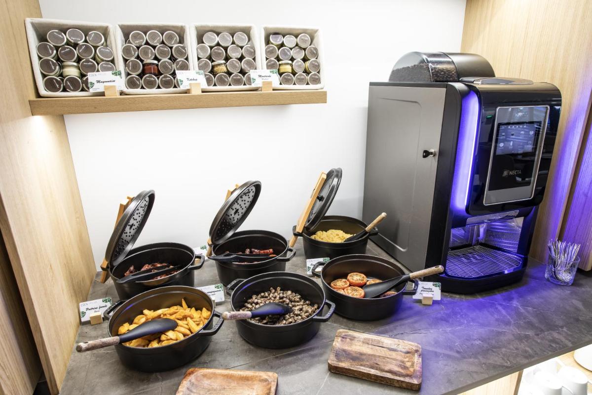 Cuisine ou kitchenette dans l'établissement Eden Hotel & Spa