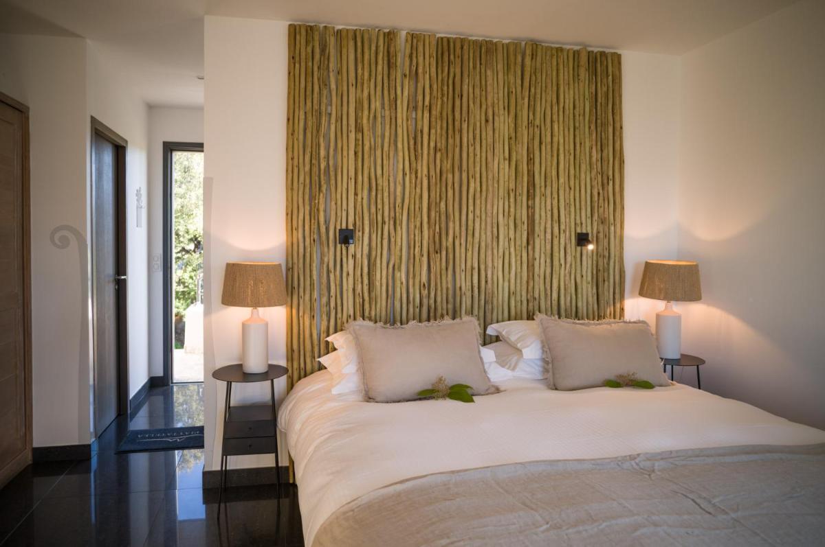 Un ou plusieurs lits dans un hébergement de l'établissement Hotel A Piattatella