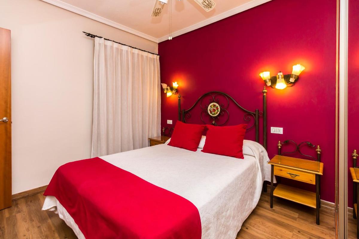 Cama o camas de una habitación en Regency Torviscas Apartments and Suites