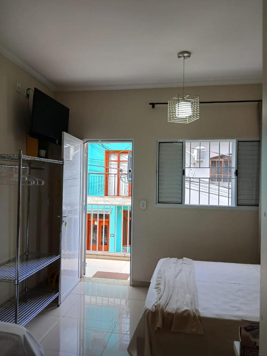 Hospedagem Quarto Chic centro Cunha - Housity
