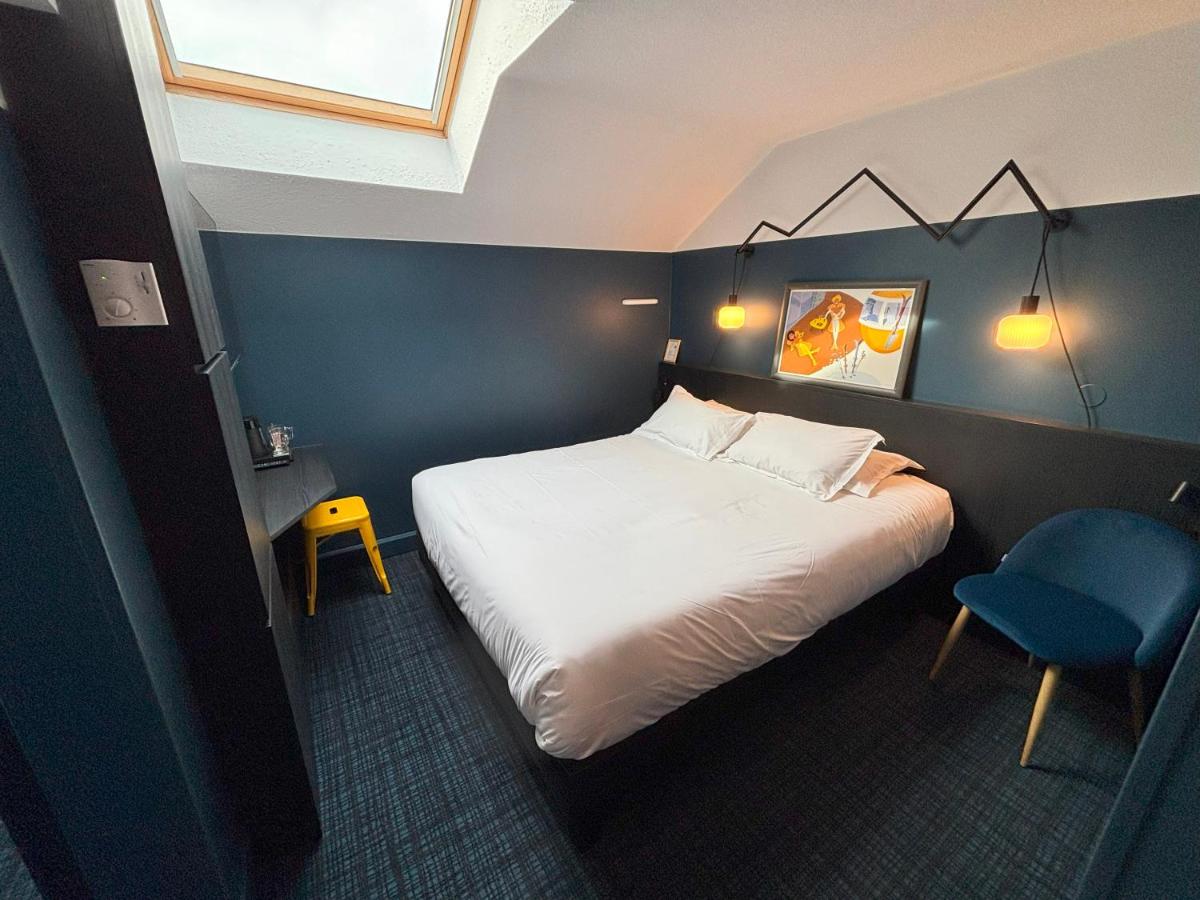 Un ou plusieurs lits dans un hébergement de l'établissement Sure Hotel by Best Western Annecy