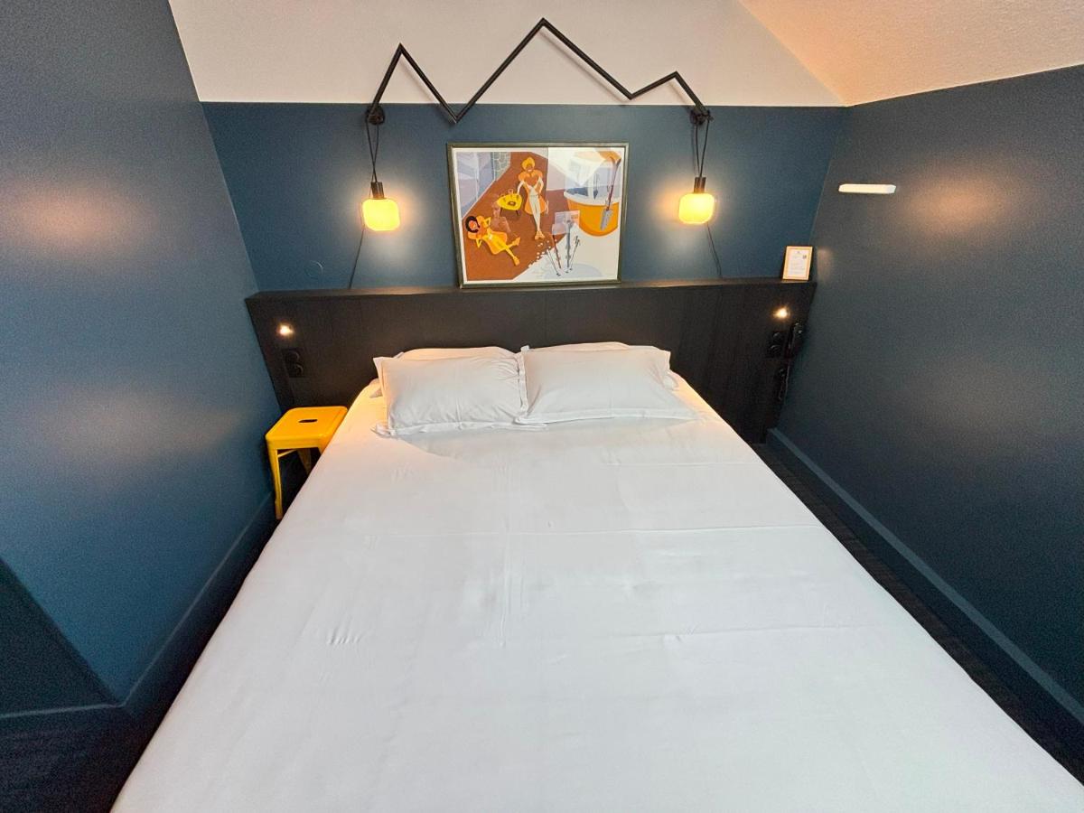 Un ou plusieurs lits dans un hébergement de l'établissement Sure Hotel by Best Western Annecy