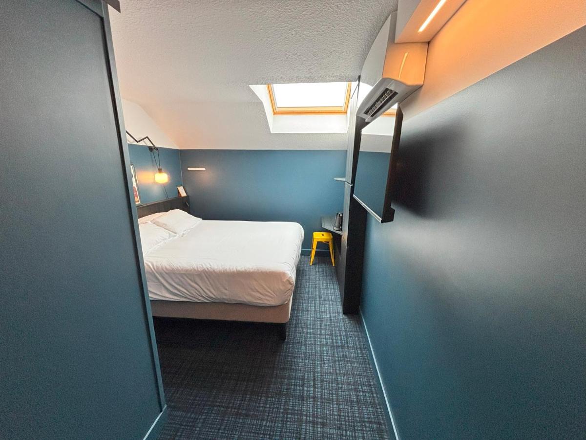 Un ou plusieurs lits dans un hébergement de l'établissement Sure Hotel by Best Western Annecy