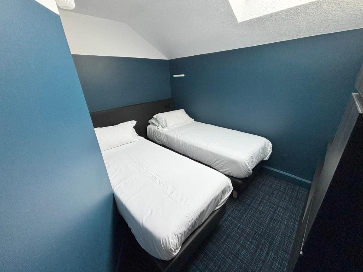 Un ou plusieurs lits dans un hébergement de l'établissement Sure Hotel by Best Western Annecy