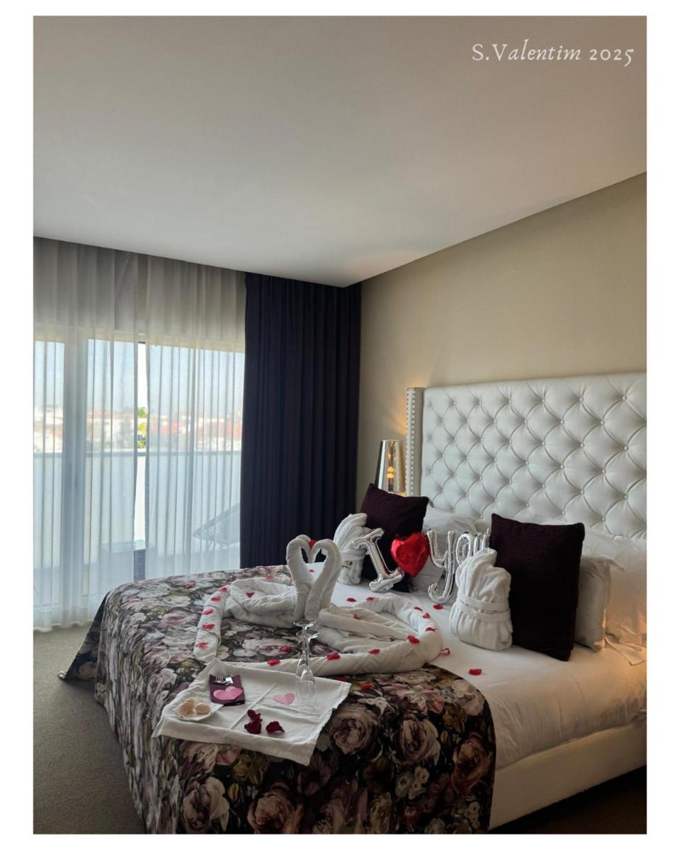 Uma cama ou camas num quarto em Hotel de Ilhavo Plaza & Spa