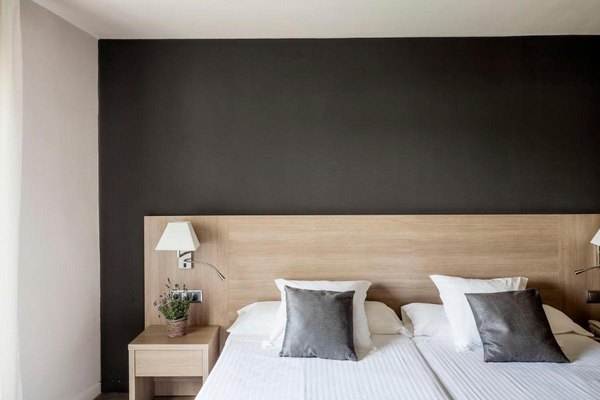 Cama o camas de una habitación en Balneari Termes Victòria