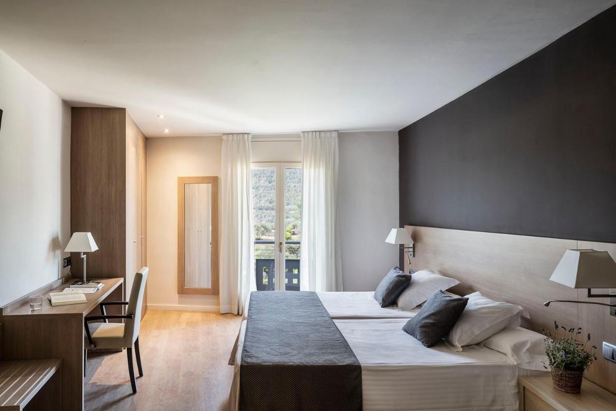 Cama o camas de una habitación en Balneari Termes Victòria