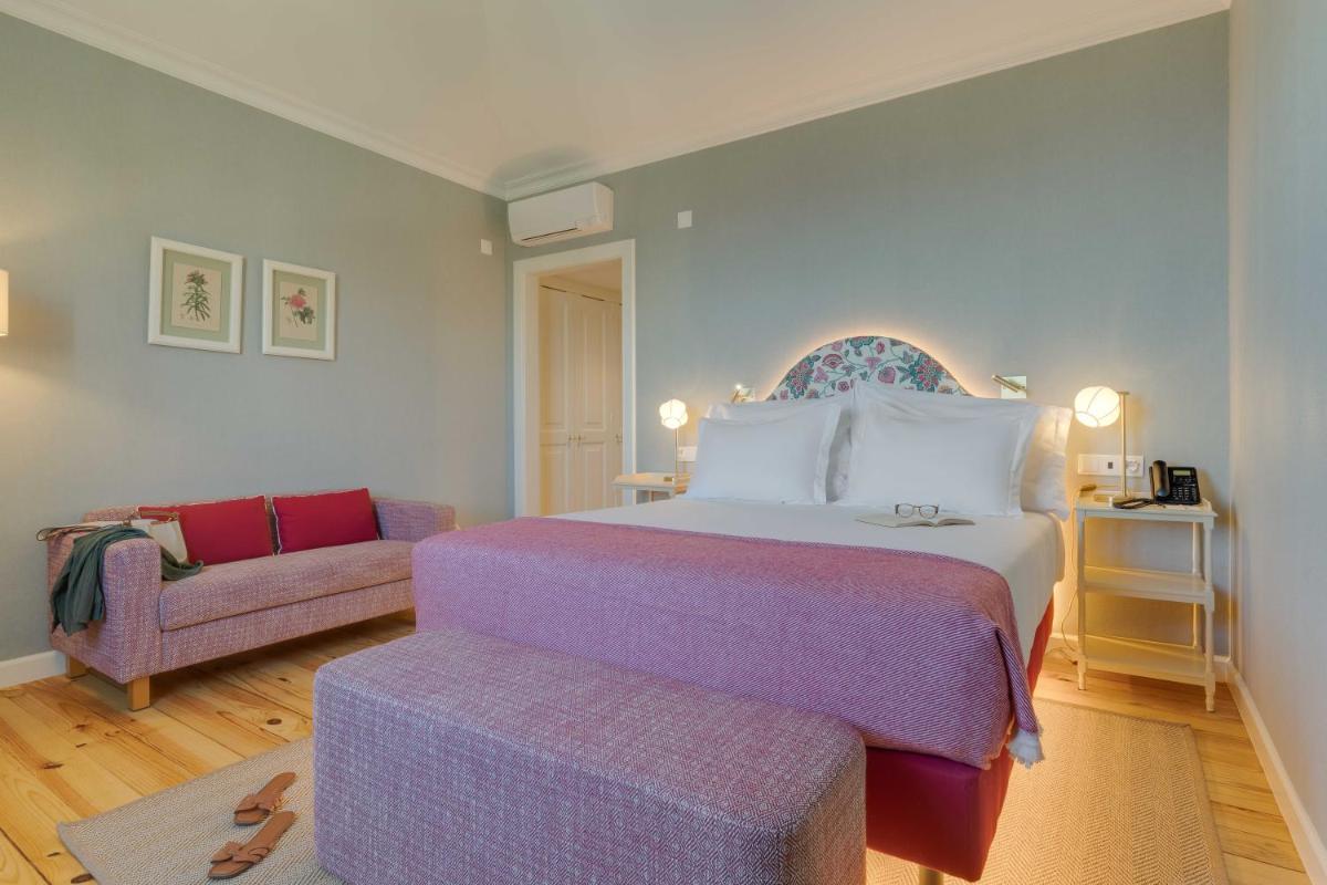 Uma cama ou camas num quarto em Pestana Quinta Perestrello