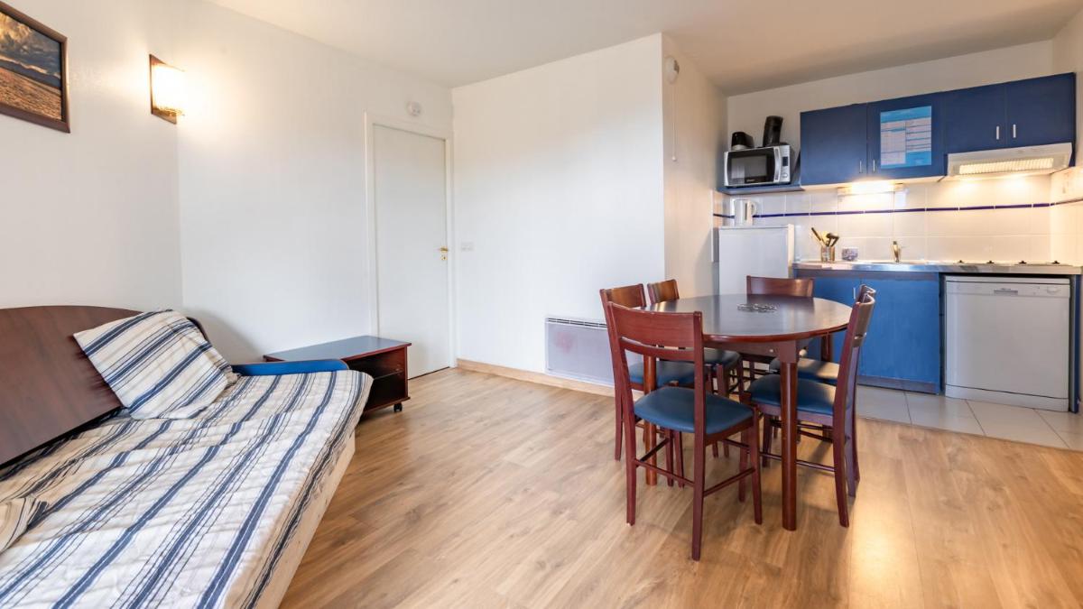 Cuisine ou kitchenette dans l'établissement Vacancéole - Appart'Vacances Pyrénées 2000
